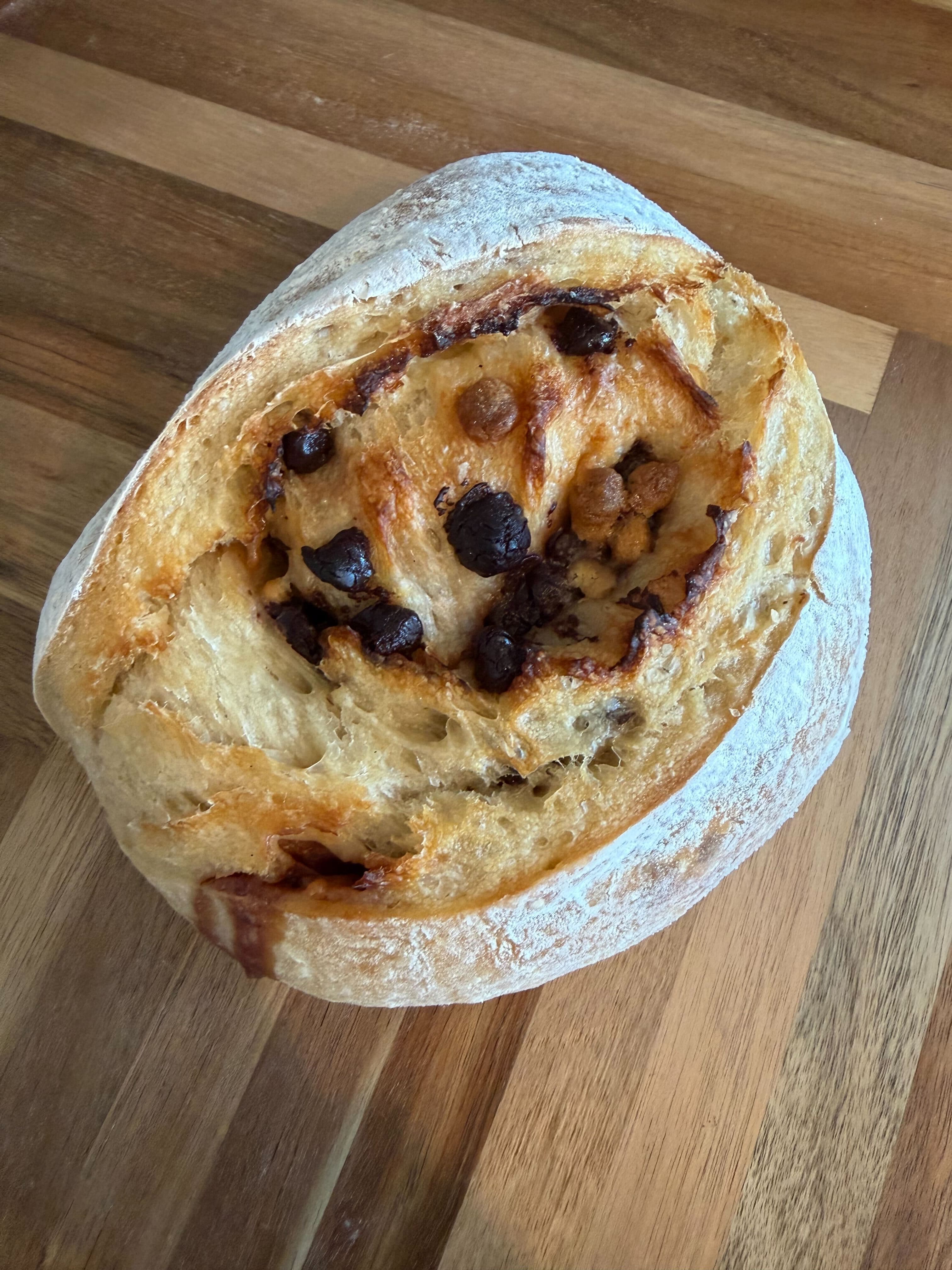 Rustic sourdough loaf with crisp crackled crust
