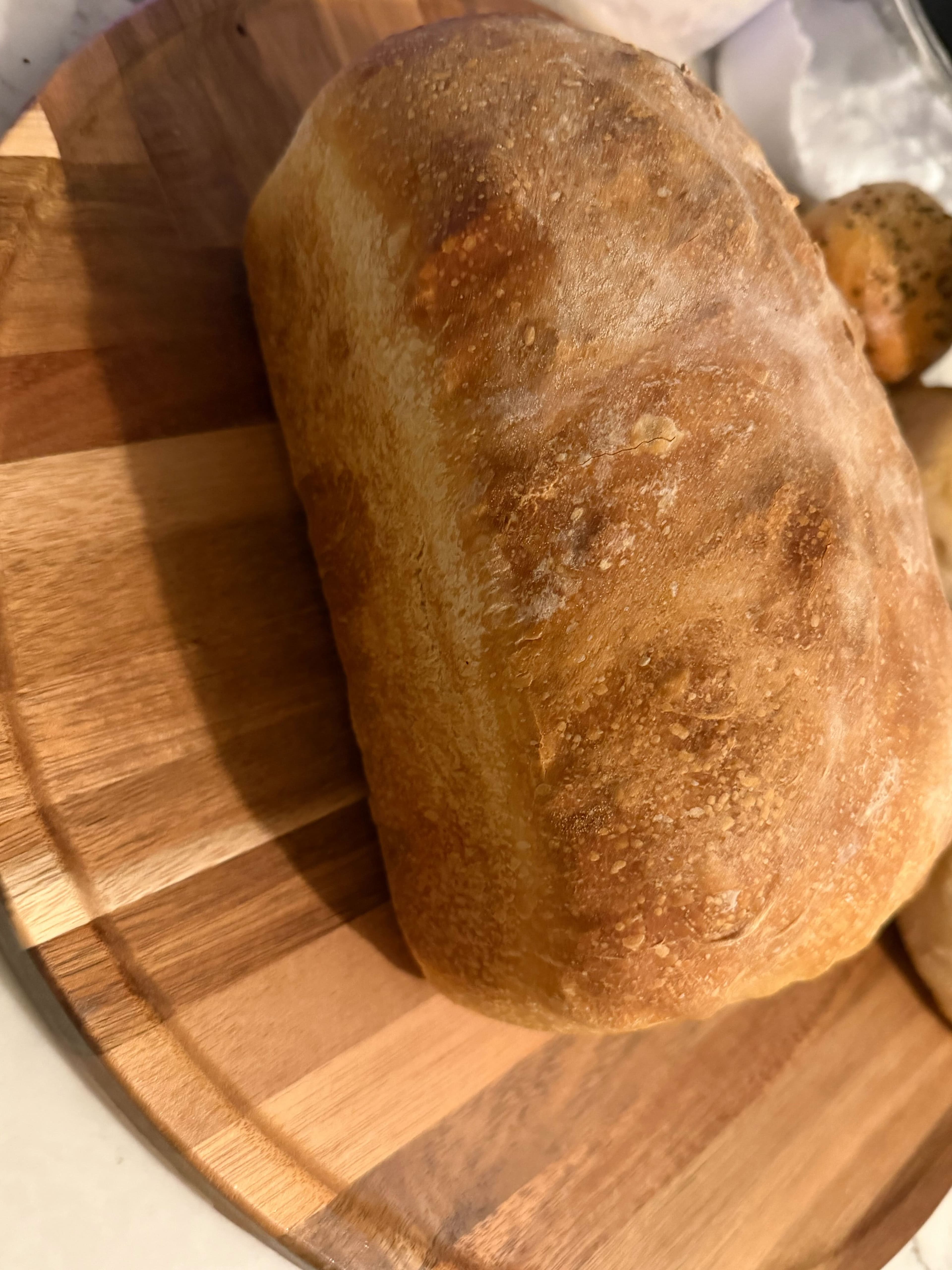 Classic round sourdough loaf with a crisp golden crust